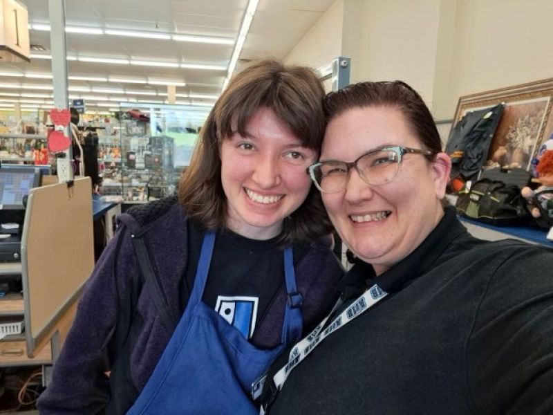 Two People Smiling Selfie In A Store